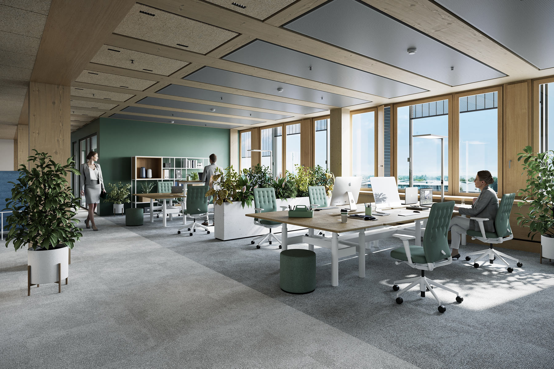 Helles Großraumbüro im UmweltHaus Nürnberg mit Pflanzen, Holz und modernen Arbeitsbereichen